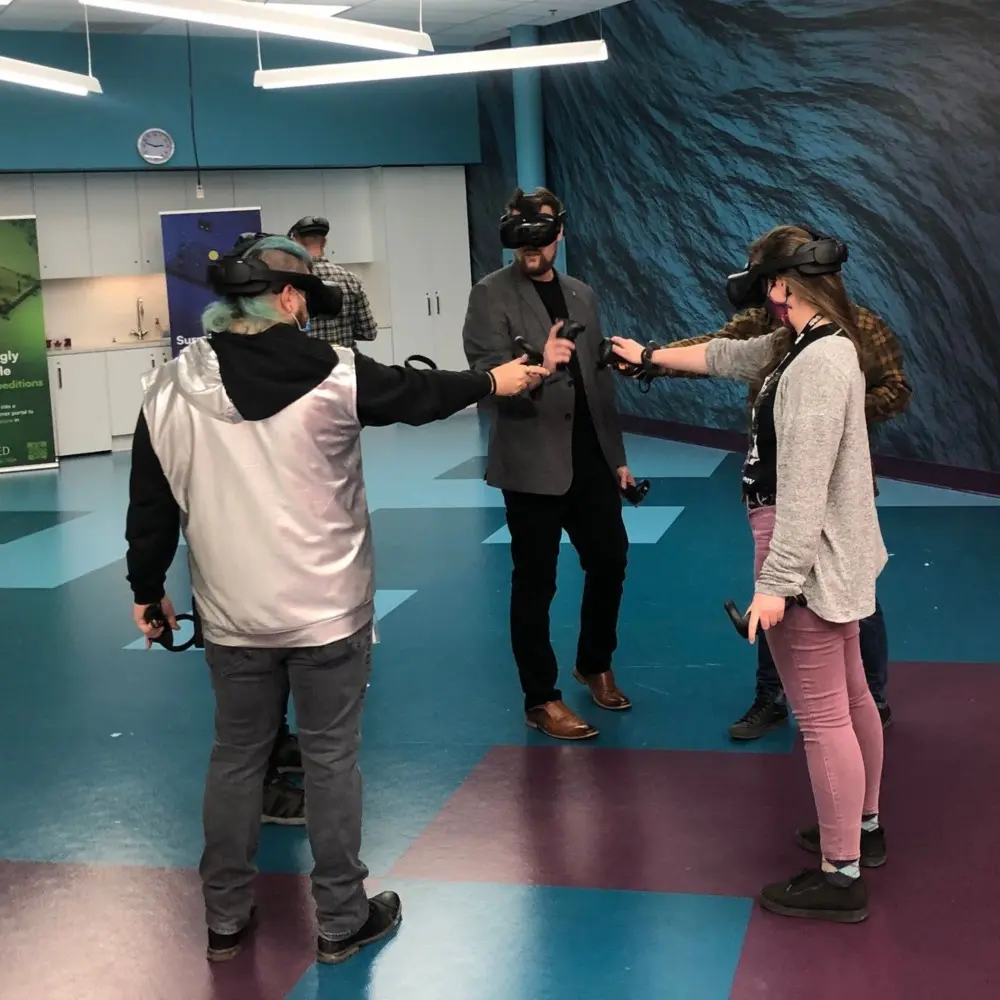 Adults testing a collaborative VR experience